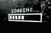 An image of a loading bar that is half-loaded.